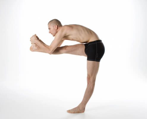 How to Do Bikram Yoga's Standing Head to Knee (Dandayamana Janushirasana) -  YouTube